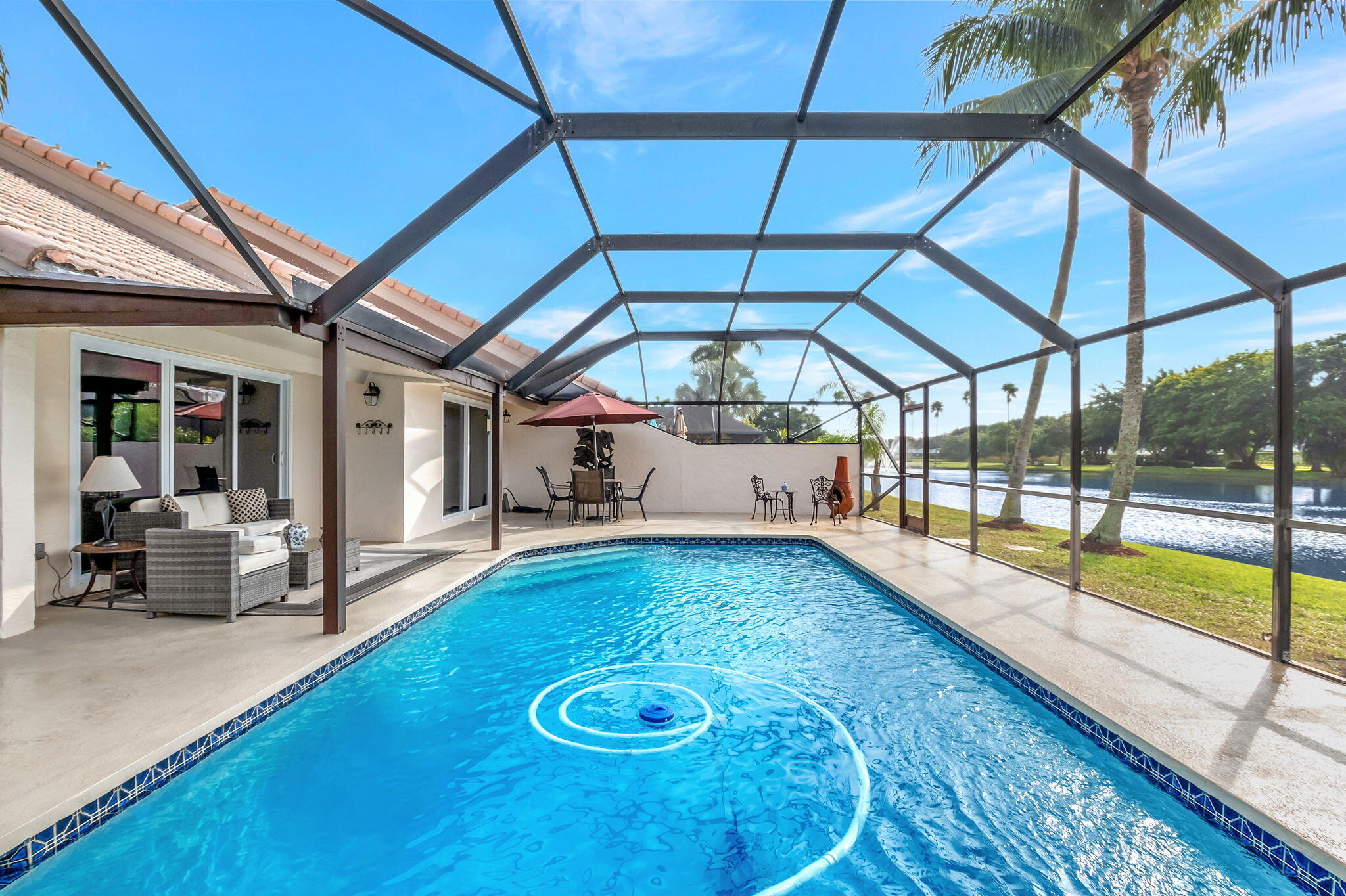 9758 Erica Court Boca Raton, FL 33496 - Photo 39 of 74 Pool, patio and lake view