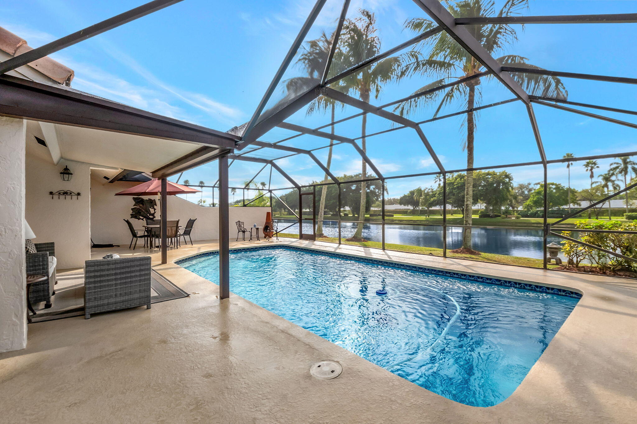 9758 Erica Court Boca Raton, FL 33496 - Photo 40 of 74 Great pool, patio and lake views