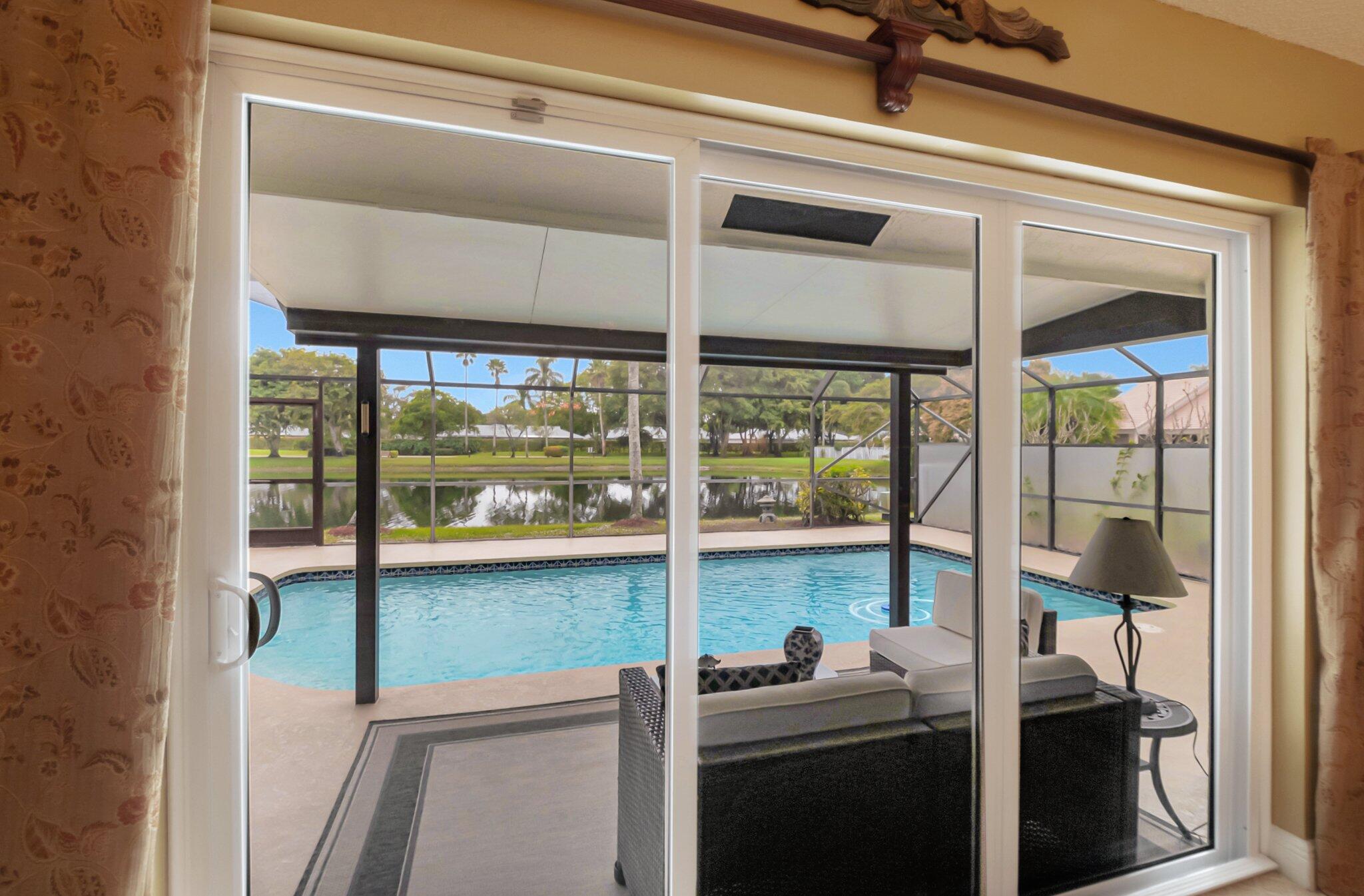 9758 Erica Court Boca Raton, FL 33496 - Photo 10 of 74 Sliders onto Patio