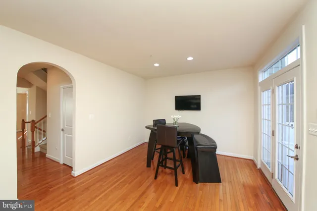 a workspace with furniture and wooden floor