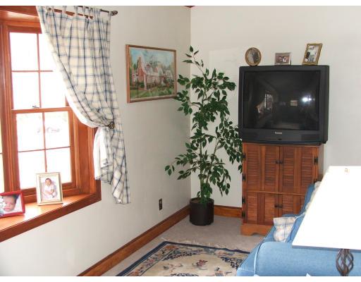 63 Cedarhill Road Holbrook, MA 02343 - Photo 12 of 18 a living room with furniture and flower pot