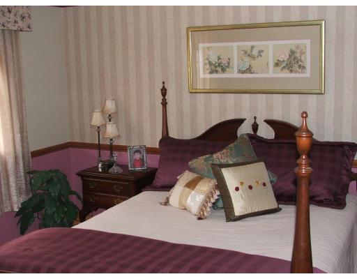 63 Cedarhill Road Holbrook, MA 02343 - Photo 13 of 18 a living room with furniture and wooden floor