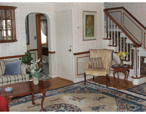 63 Cedarhill Road Holbrook, MA 02343 - Photo 10 of 18 a view of a livingroom with furniture and a table
