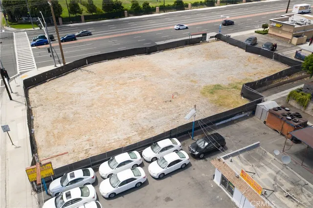 swimming pool view with a backyard space