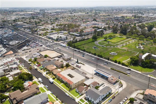an aerial view of residential houses with outdoor space