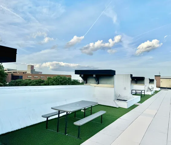 a view of swimming pool with seating
