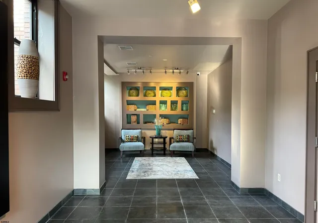 a bathroom with a mirror and a shower