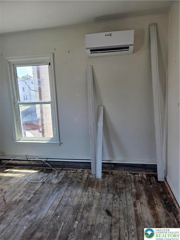 210 2nd Street Slatington, PA 18080 - Photo 19 of 28 a view of an empty room with wooden floor and a window