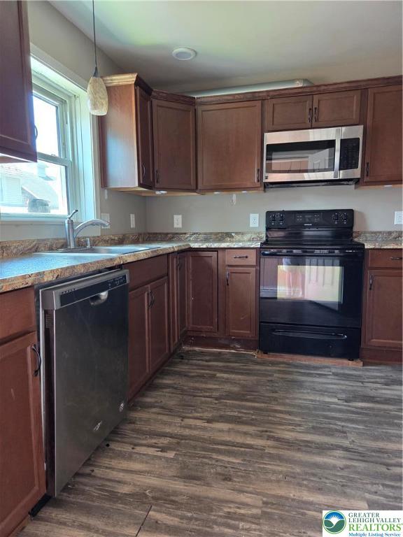 210 2nd Street Slatington, PA 18080 - Photo 2 of 28 a kitchen with stainless steel appliances granite countertop a stove sink and cabinets