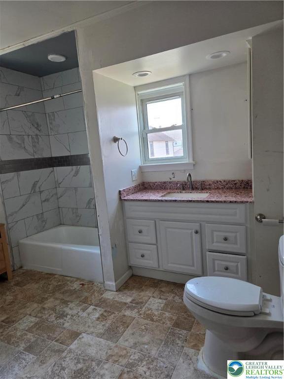 210 2nd Street Slatington, PA 18080 - Photo 7 of 28 a bathroom with a sink a toilet and bathtub