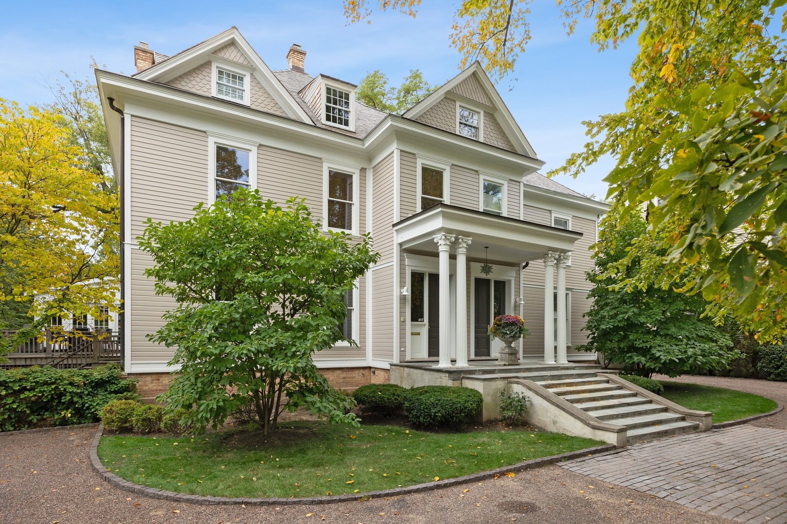 417 East Deerpath Road Lake Forest, IL 60045 - Photo 1 of 43 a view of a white house with a sink and garden
