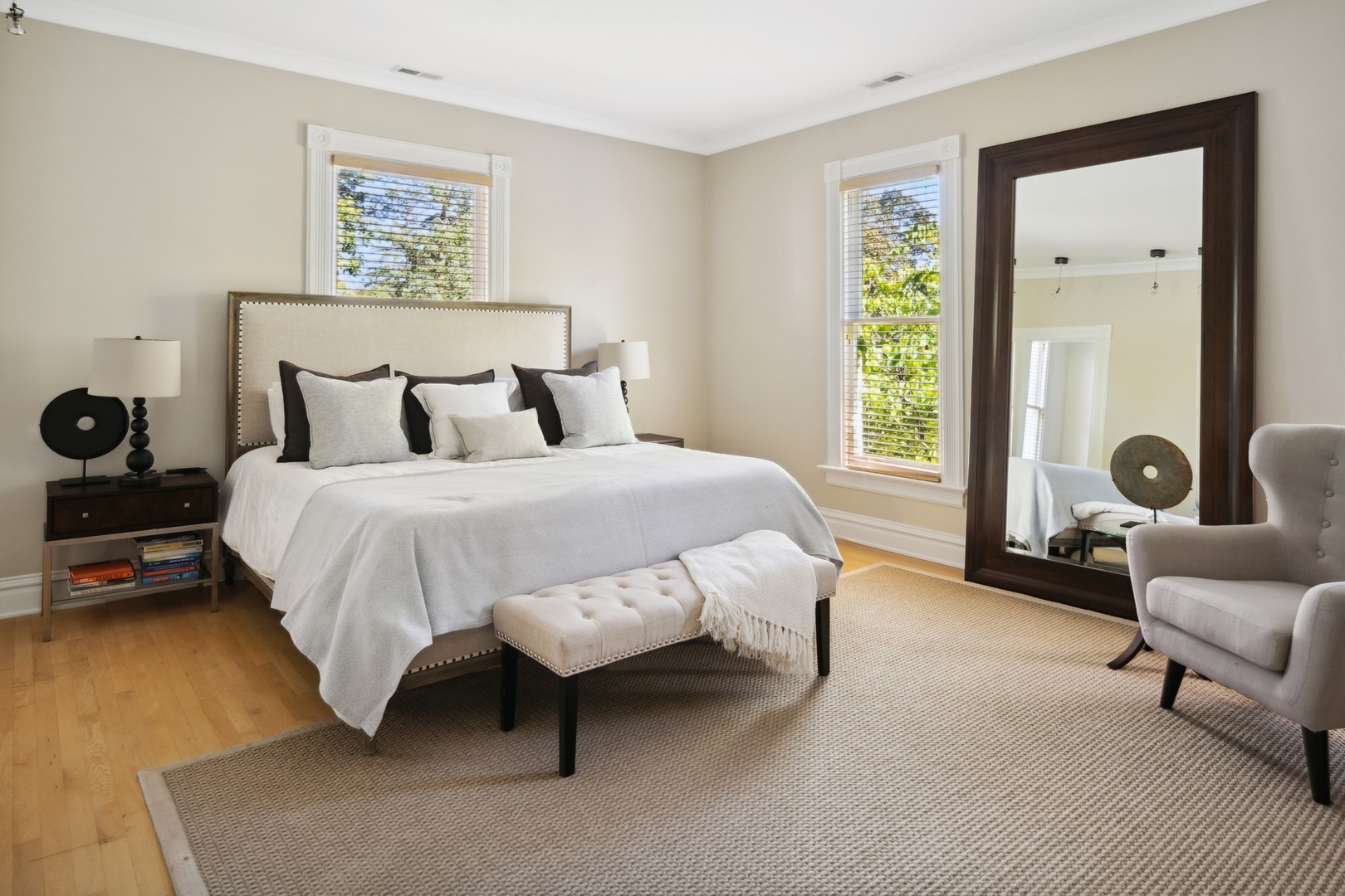 417 East Deerpath Road Lake Forest, IL 60045 - Photo 19 of 43 a spacious bedroom with a bed a couch and a window