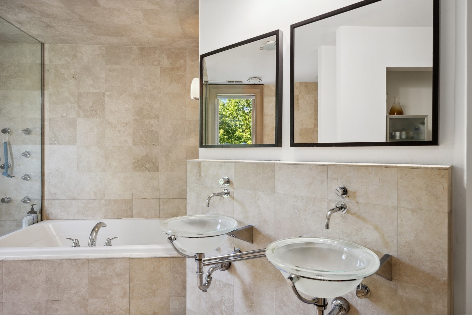 417 East Deerpath Road Lake Forest, IL 60045 - Photo 21 of 43 a bathroom with a sink and a mirror