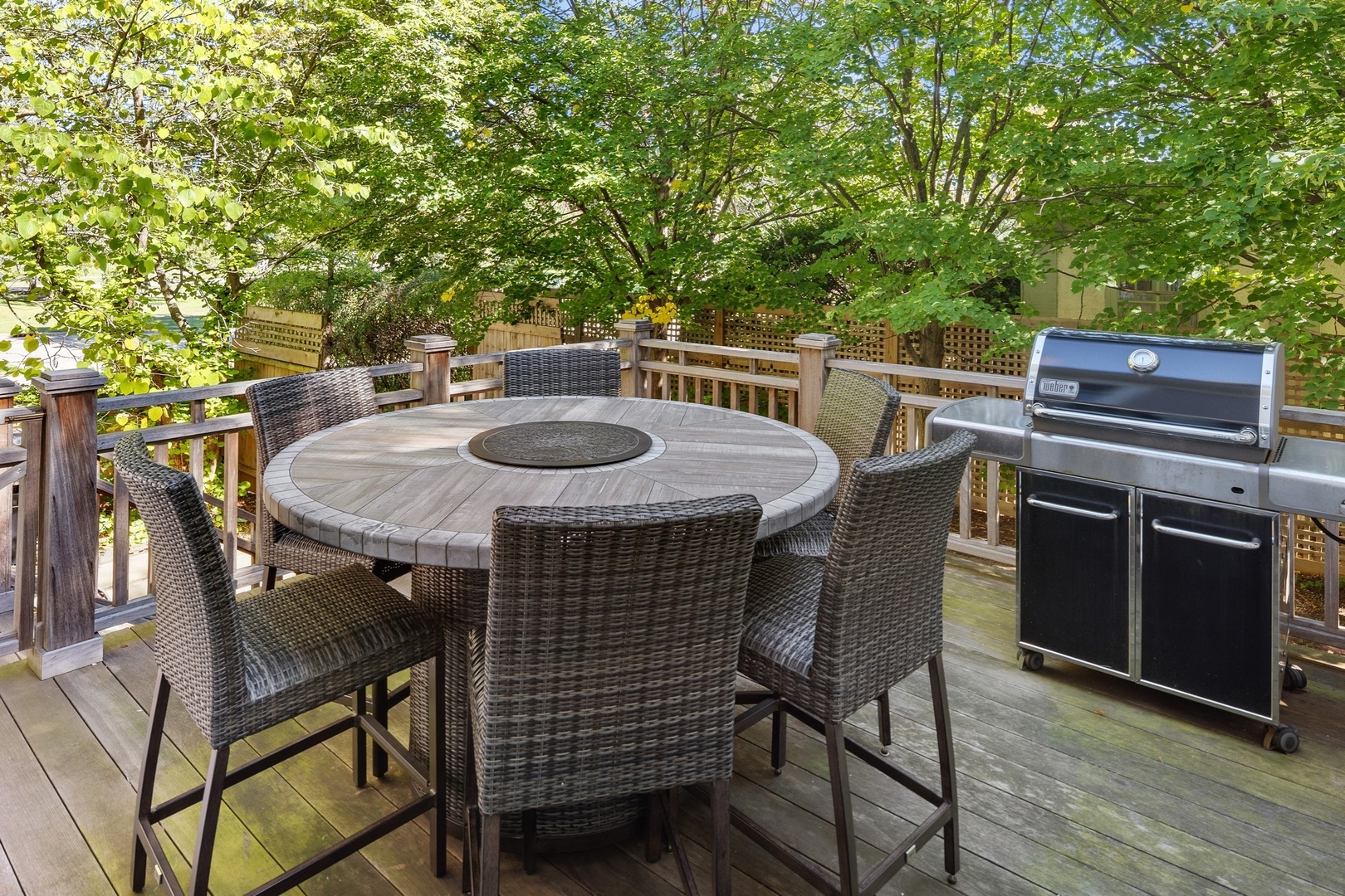 417 East Deerpath Road Lake Forest, IL 60045 - Photo 32 of 43 a view of a dinning table and chairs in the patio