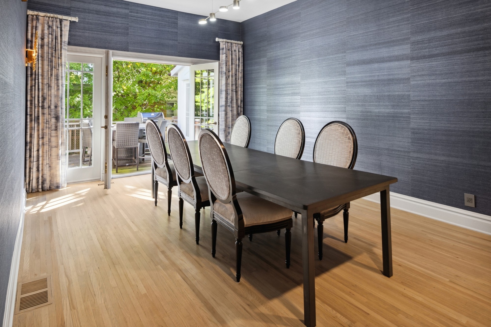 417 East Deerpath Road Lake Forest, IL 60045 - Photo 8 of 43 a view of a dining room with furniture window and wooden floor