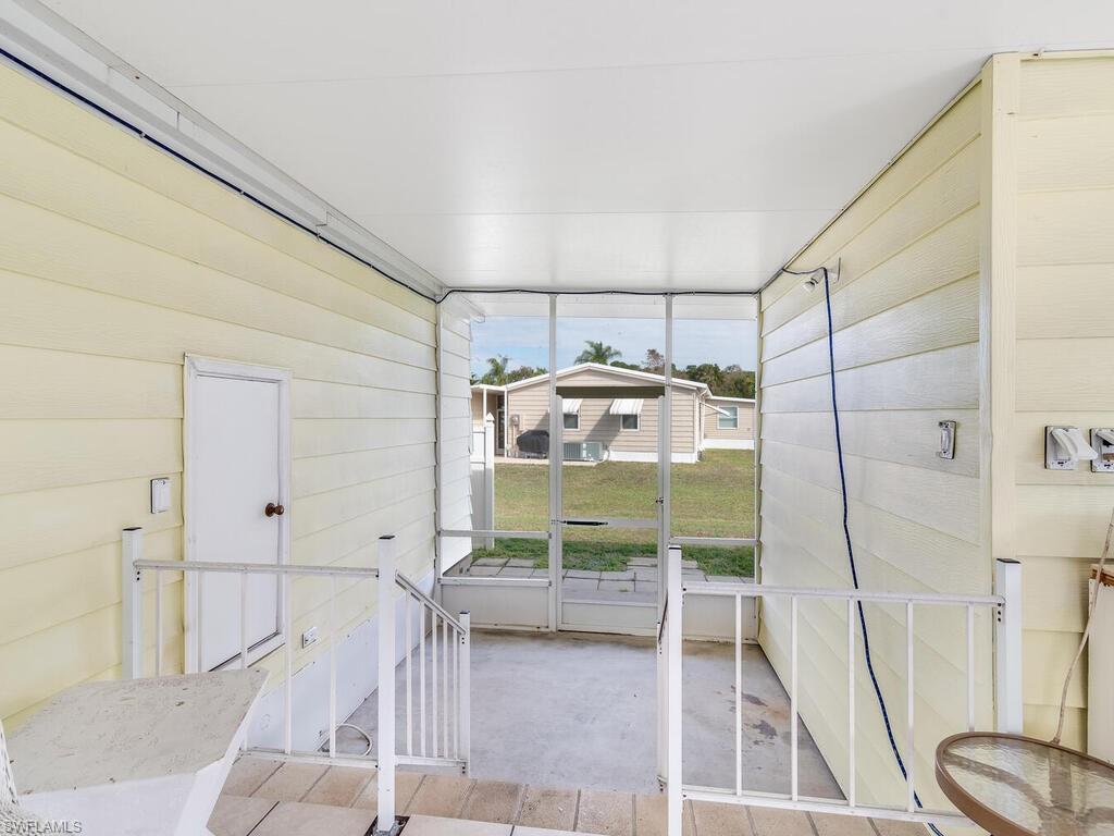 114 Audubon Road Naples, FL 34114 - Photo 22 of 34 a room with a washing machine and a tub
