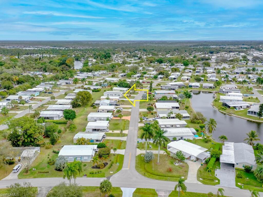 114 Audubon Road Naples, FL 34114 - Photo 24 of 34 an aerial view of residential houses with outdoor space and street view