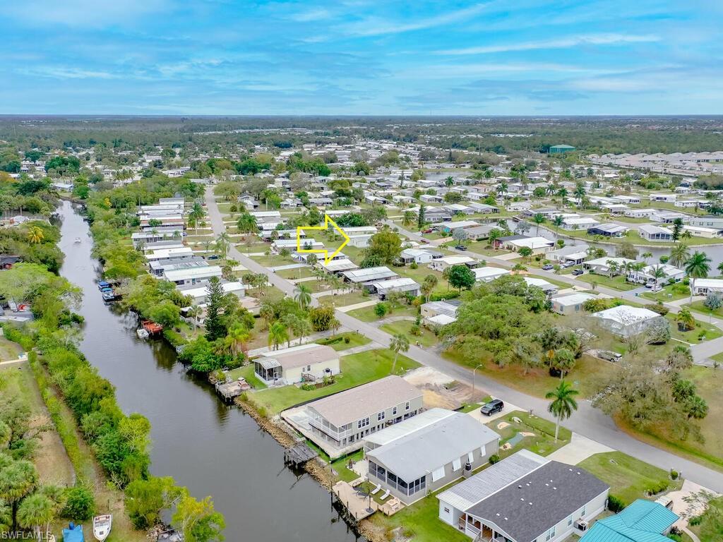 114 Audubon Road Naples, FL 34114 - Photo 25 of 34 an aerial view of residential houses with outdoor space