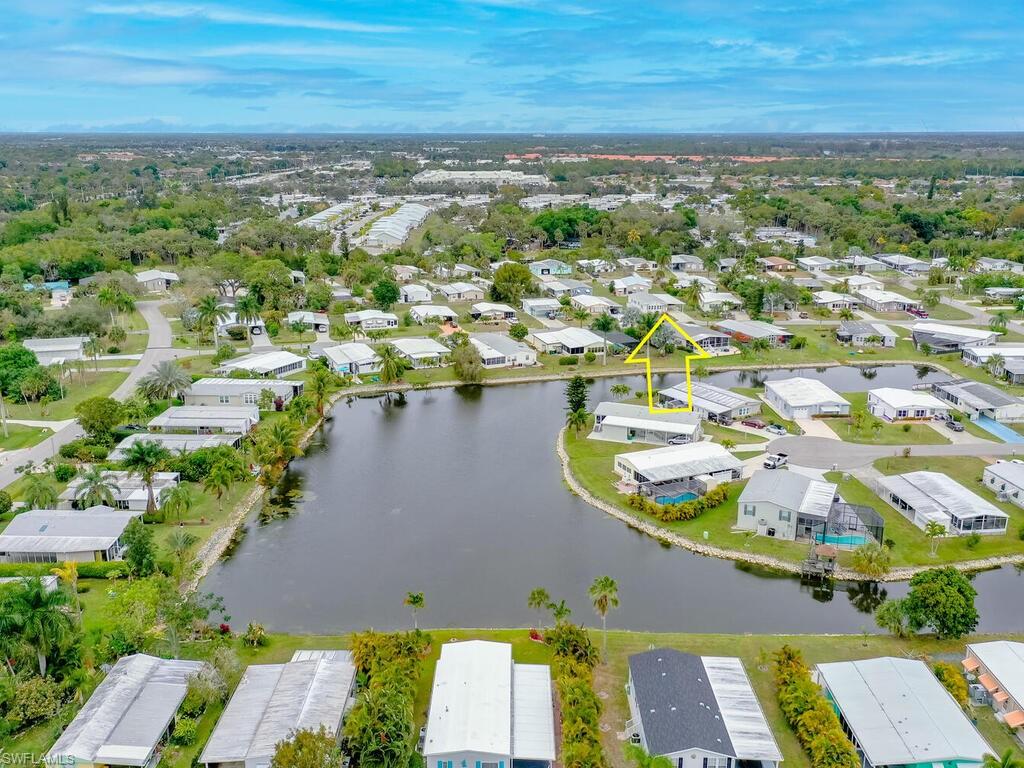 114 Audubon Road Naples, FL 34114 - Photo 27 of 34 an aerial view of residential houses with outdoor space