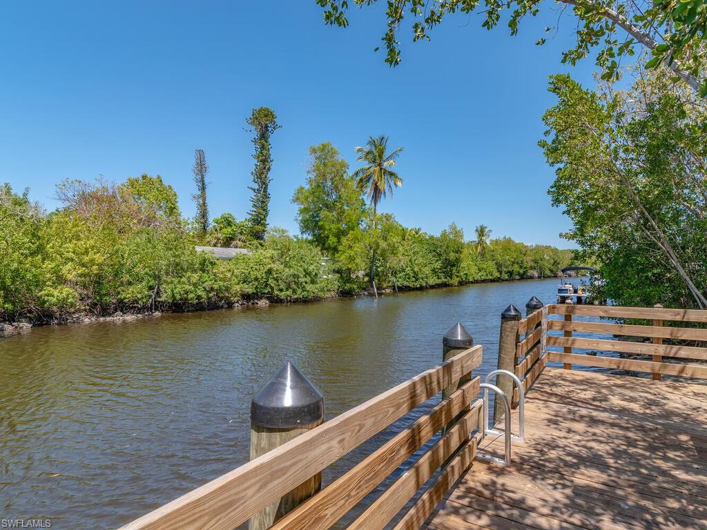 114 Audubon Road Naples, FL 34114 - Photo 34 of 34 a view of a lake with a outdoor space
