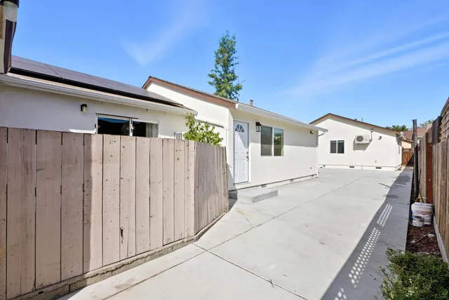 a view of a house with a patio