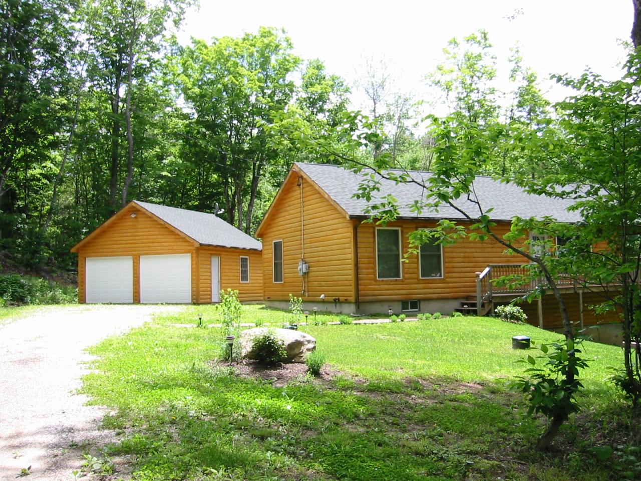 10 Calvin Road Hinsdale, MA 01235 - Photo 1 of 18 a front view of house with yard and green space
