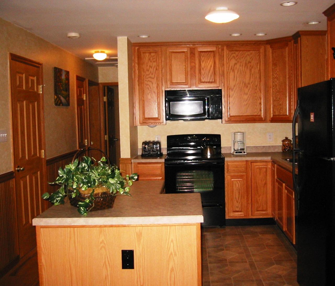 10 Calvin Road Hinsdale, MA 01235 - Photo 8 of 18 a kitchen with kitchen island granite countertop stainless steel appliances and cabinets
