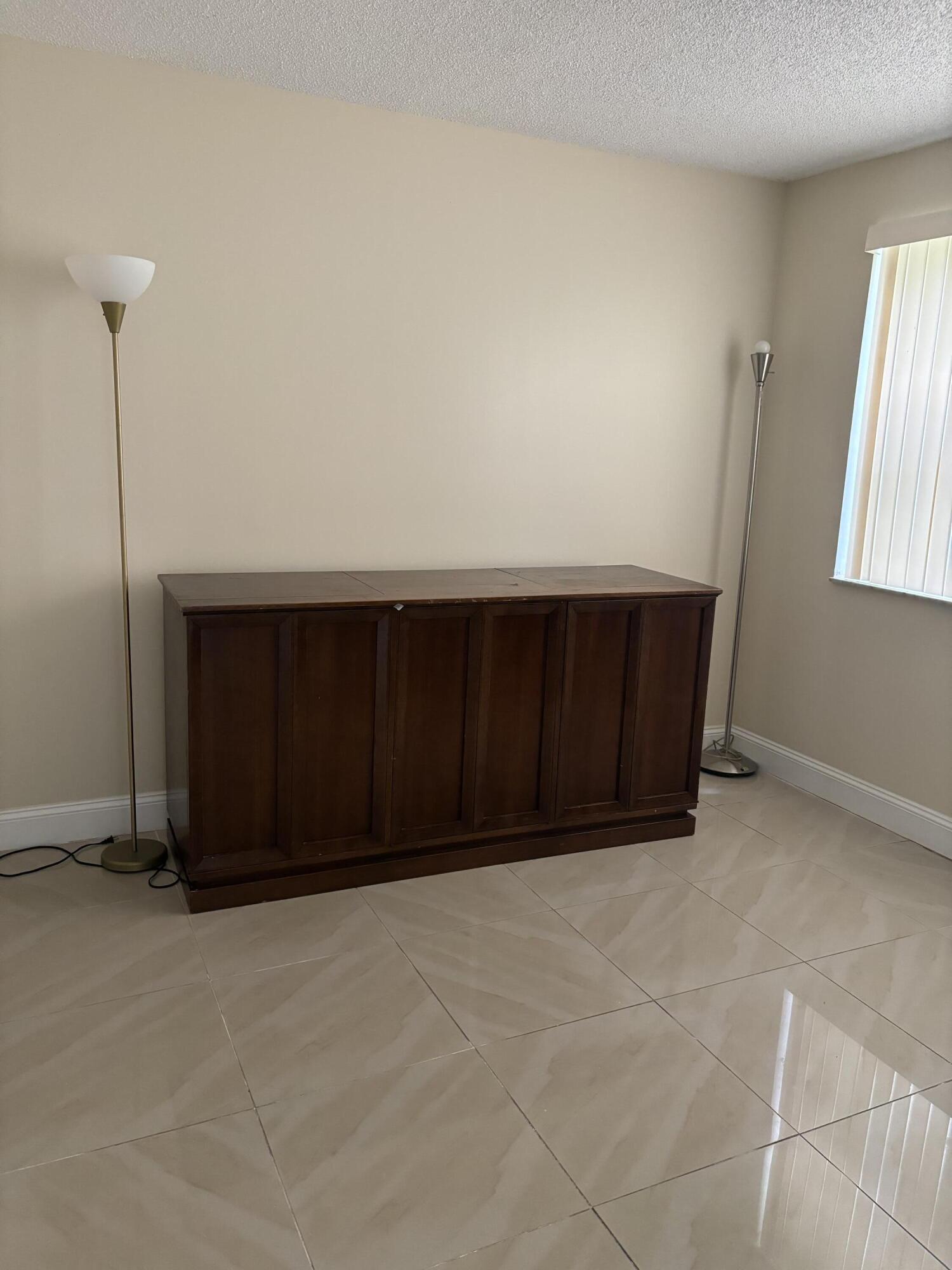 9033 Wiles Road, Unit 102 Coral Springs, FL 33067 - Photo 11 of 17 IMG_1427