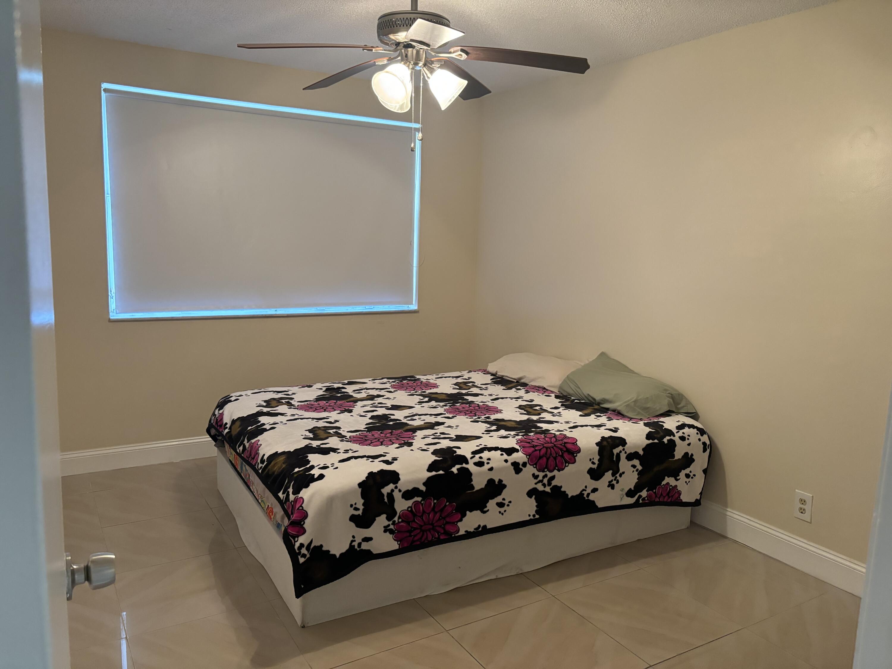 9033 Wiles Road, Unit 102 Coral Springs, FL 33067 - Photo 12 of 17 IMG_1450