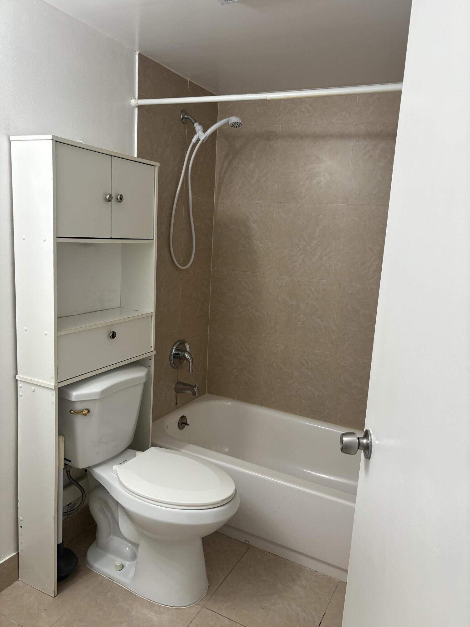 9033 Wiles Road, Unit 102 Coral Springs, FL 33067 - Photo 13 of 17 IMG_1425