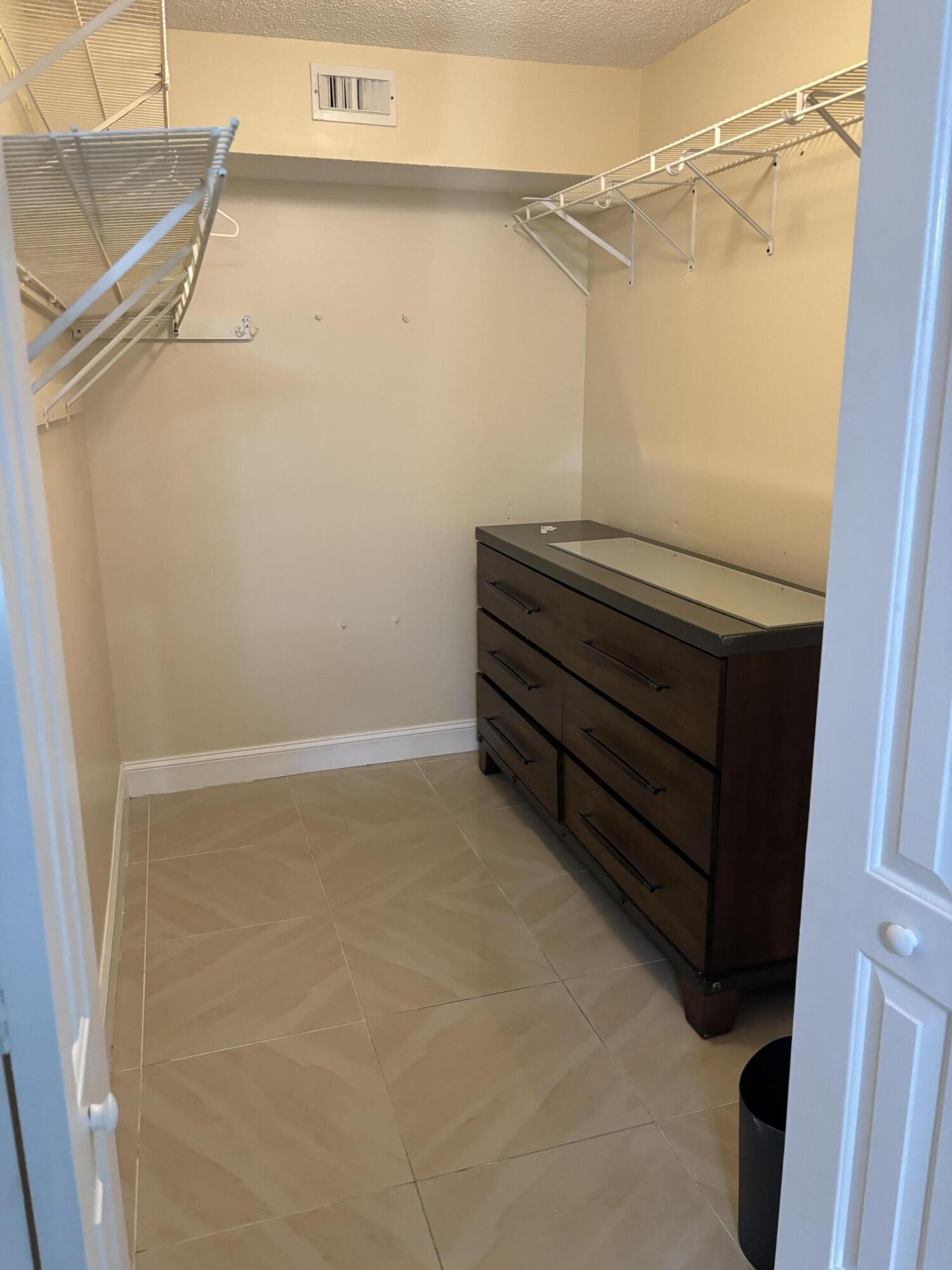 9033 Wiles Road, Unit 102 Coral Springs, FL 33067 - Photo 7 of 17 IMG_1414