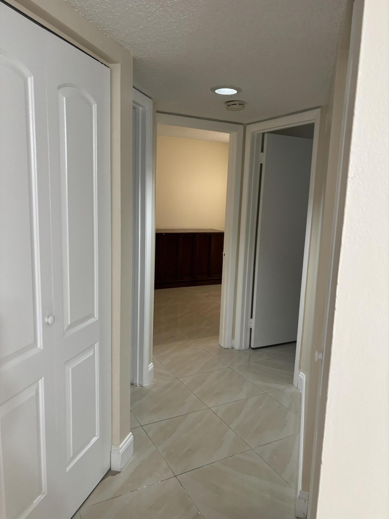 9033 Wiles Road, Unit 102 Coral Springs, FL 33067 - Photo 10 of 17 IMG_1424