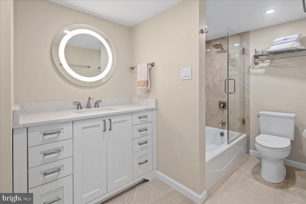 1101 South Arlington Ridge Road, Unit 402 Arlington, VA 22202 - Photo 41 of 61 Modern elegance in a serene bathroom.