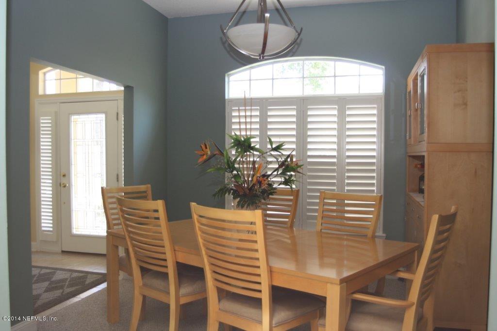 97178 Castle Ridge Drive Yulee, FL 32097 - Photo 10 of 14 a dining room with furniture and window