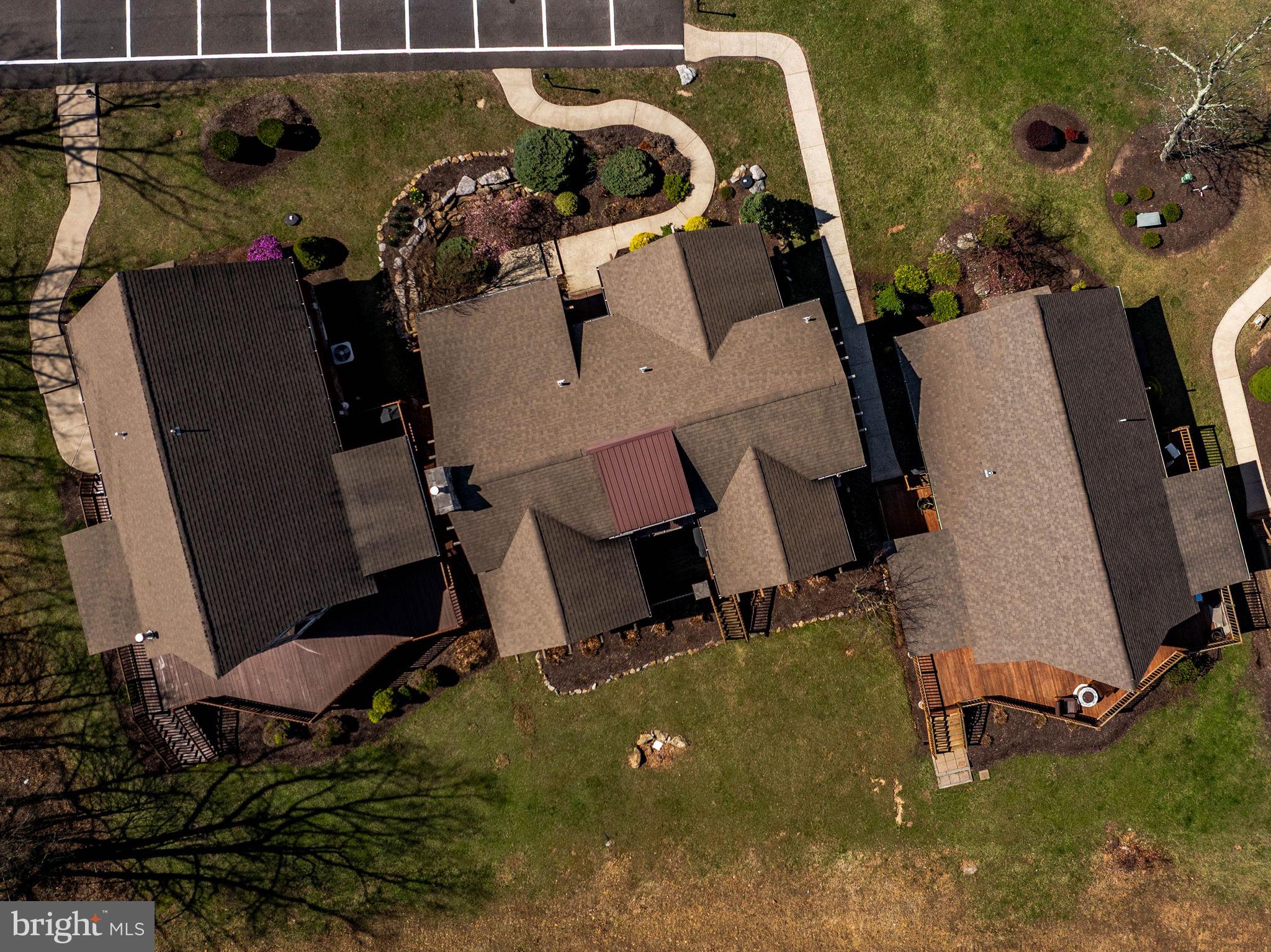18 Sugarloaf Lane Hazleton, PA 18202 - Photo 14 of 85 an aerial view of a backyard with table and chairs