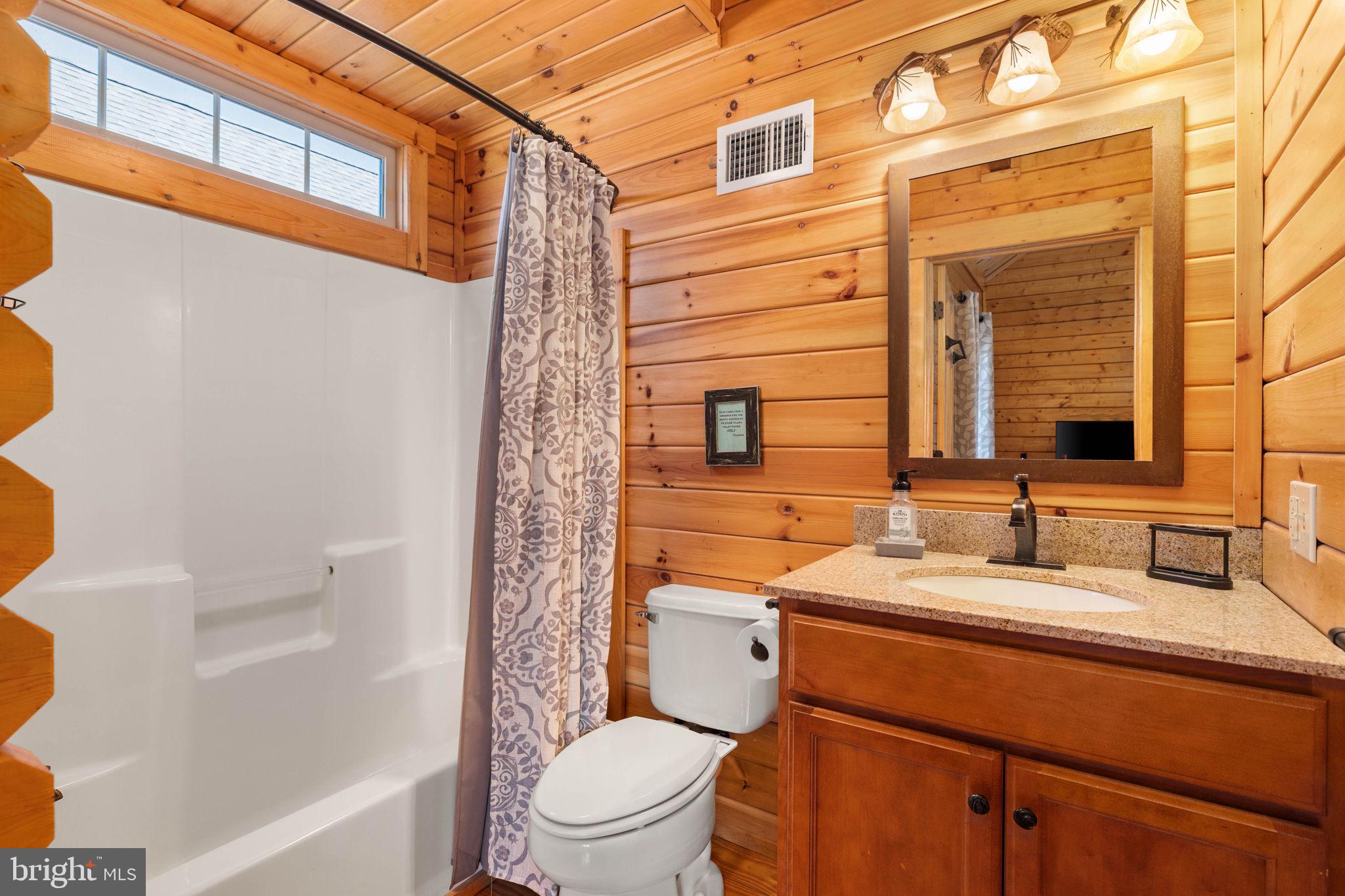 18 Sugarloaf Lane Hazleton, PA 18202 - Photo 30 of 85 a bathroom with a sink toilet vanity and shower