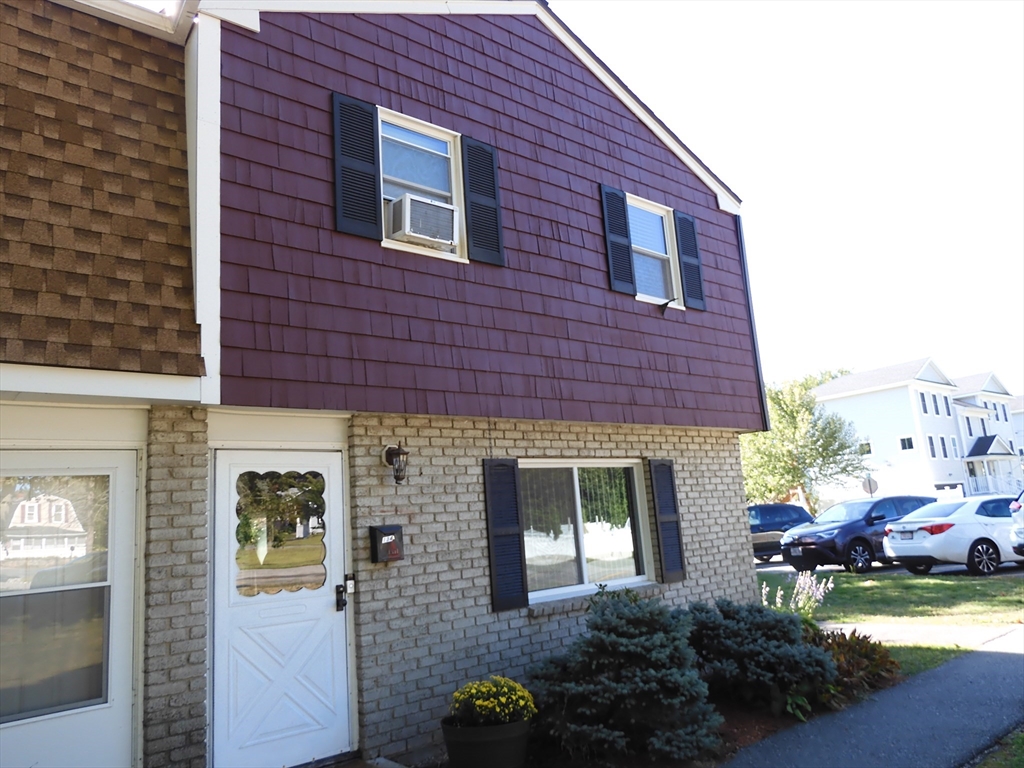 134 Old Ferry Road, Unit A Haverhill, MA 01830 - Photo 1 of 24 a front view of a house with garden