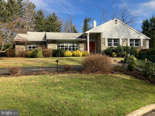 1201 Ricewynn Road Wyncote, PA 19095 - Photo 1 of 53 a front view of a house with garden