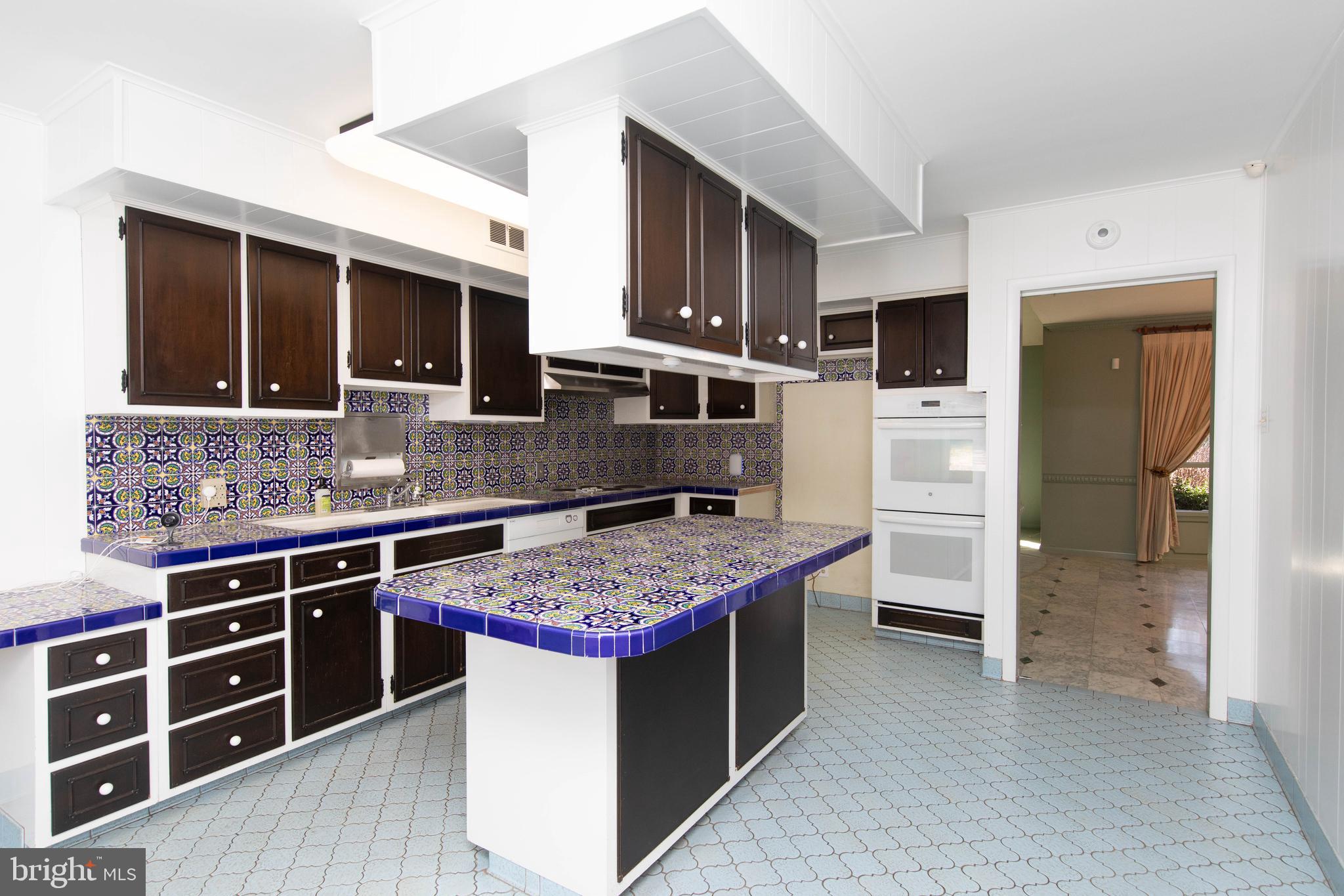 1201 Ricewynn Road Wyncote, PA 19095 - Photo 15 of 53 a kitchen with stainless steel appliances granite countertop a stove and a sink