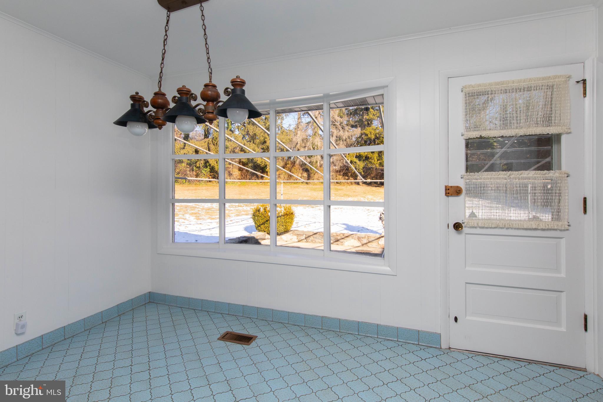 1201 Ricewynn Road Wyncote, PA 19095 - Photo 17 of 53 a view of an empty room with a window