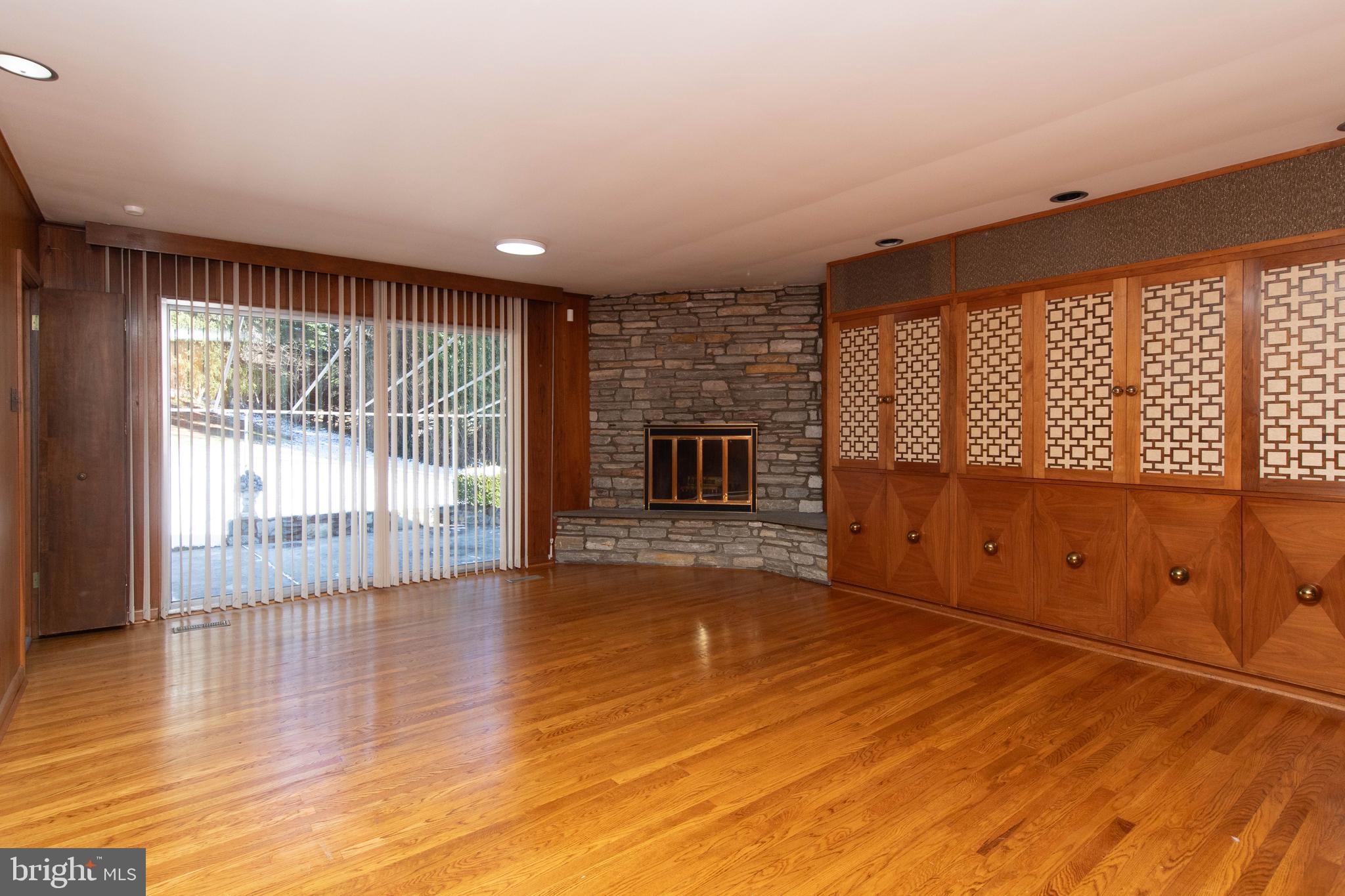 1201 Ricewynn Road Wyncote, PA 19095 - Photo 21 of 53 an empty room with wooden floor and windows