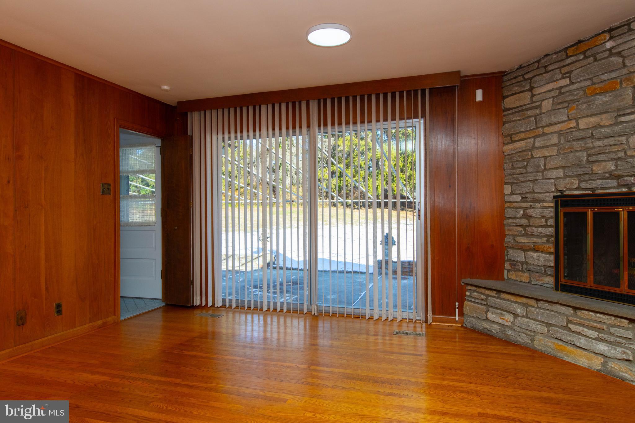1201 Ricewynn Road Wyncote, PA 19095 - Photo 22 of 53 an empty room with wooden floor and windows