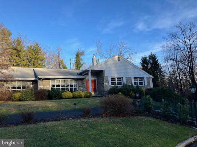 1201 Ricewynn Road Wyncote, PA 19095 - Photo 3 of 53 a front view of a house with a garden