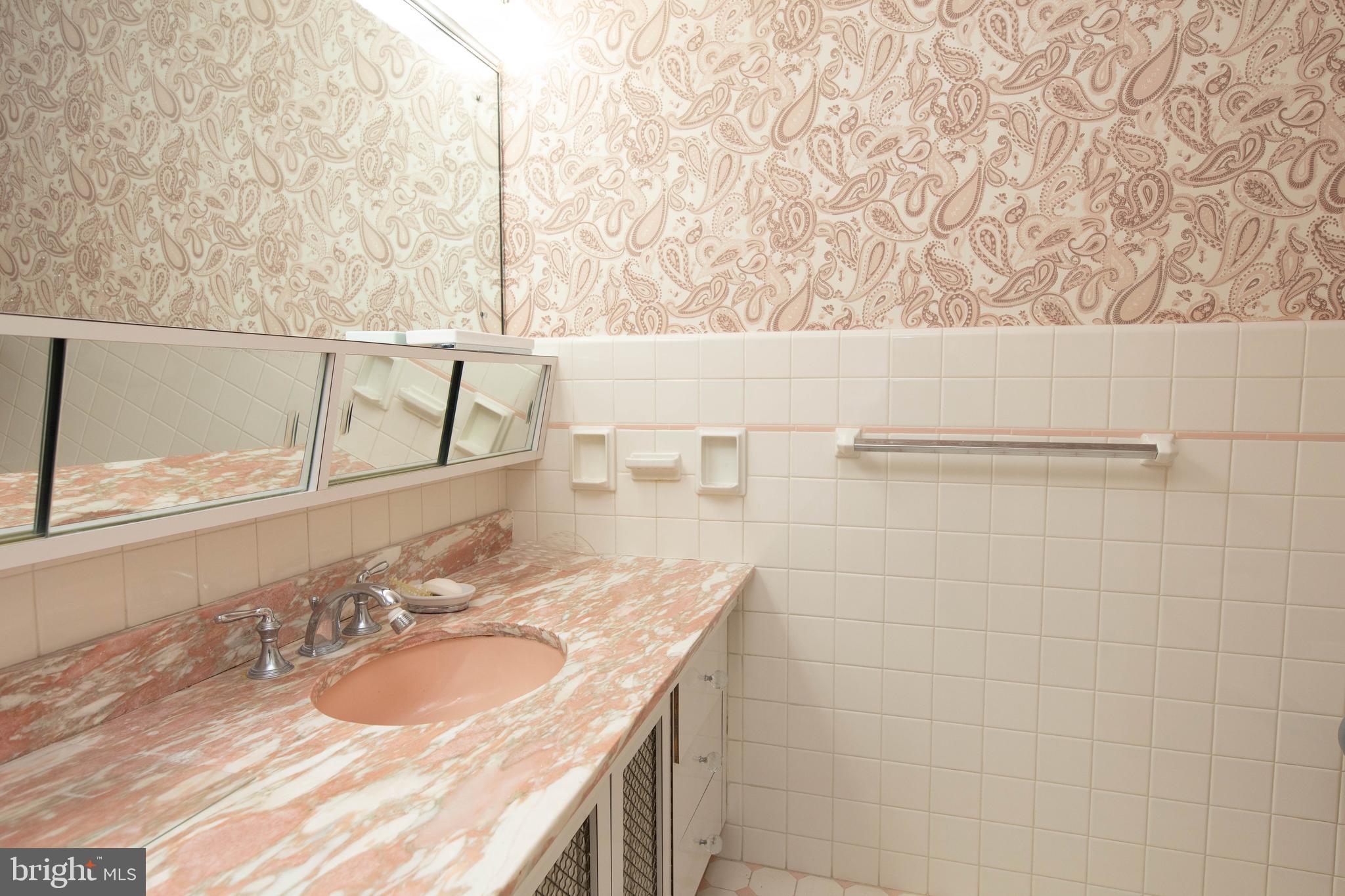 1201 Ricewynn Road Wyncote, PA 19095 - Photo 31 of 53 a bathroom with a sink and a mirror