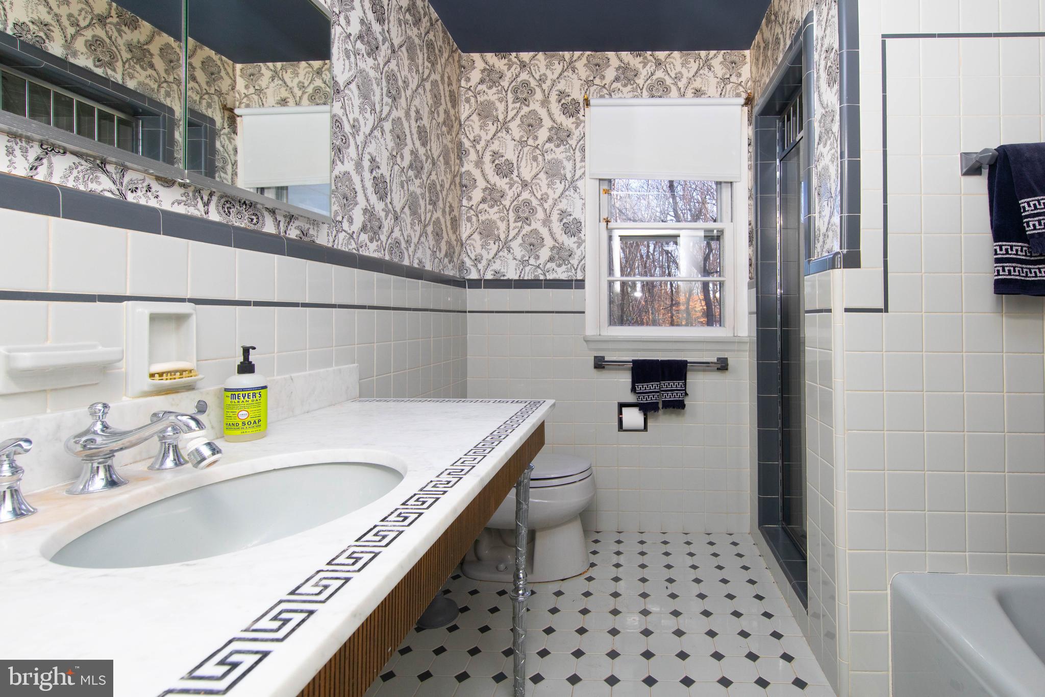 1201 Ricewynn Road Wyncote, PA 19095 - Photo 36 of 53 a bathroom with a sink and a bathtub