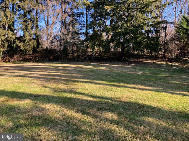 1201 Ricewynn Road Wyncote, PA 19095 - Photo 48 of 53 a view of pool and trees in the background