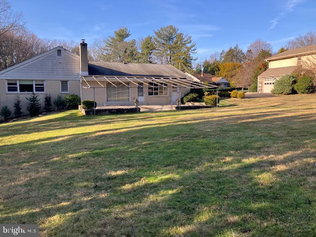 1201 Ricewynn Road Wyncote, PA 19095 - Photo 5 of 53 a view of a house with a big yard and large trees