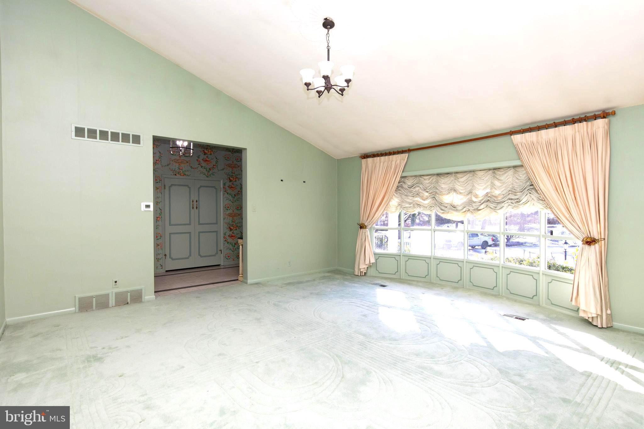 1201 Ricewynn Road Wyncote, PA 19095 - Photo 9 of 53 a view of an empty room with a window