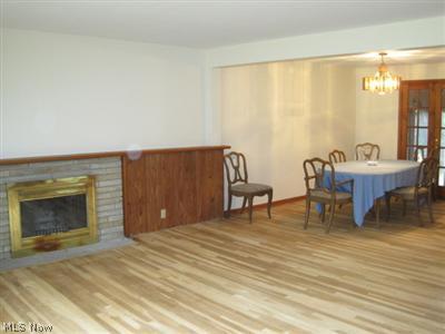 1129 Croyden Road Lyndhurst, OH 44124 - Photo 3 of 25 Living room has fireplace and flows into a spacious formal dinning room.