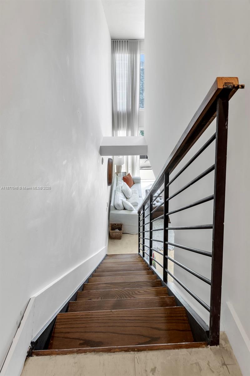 60 Southwest 13th Street, Unit 3402 Miami, FL 33130 - Photo 12 of 29 a view of entryway and hall with wooden floor